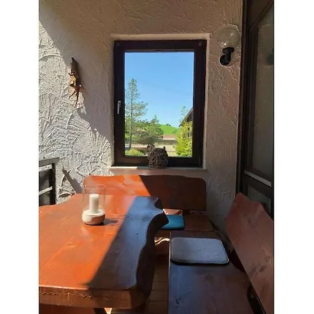 In Prázdninový dům *